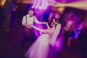 A bride and groom dancing