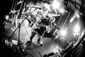 Wedding band guitarist performing live