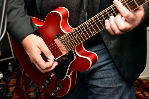 A guitar being played.